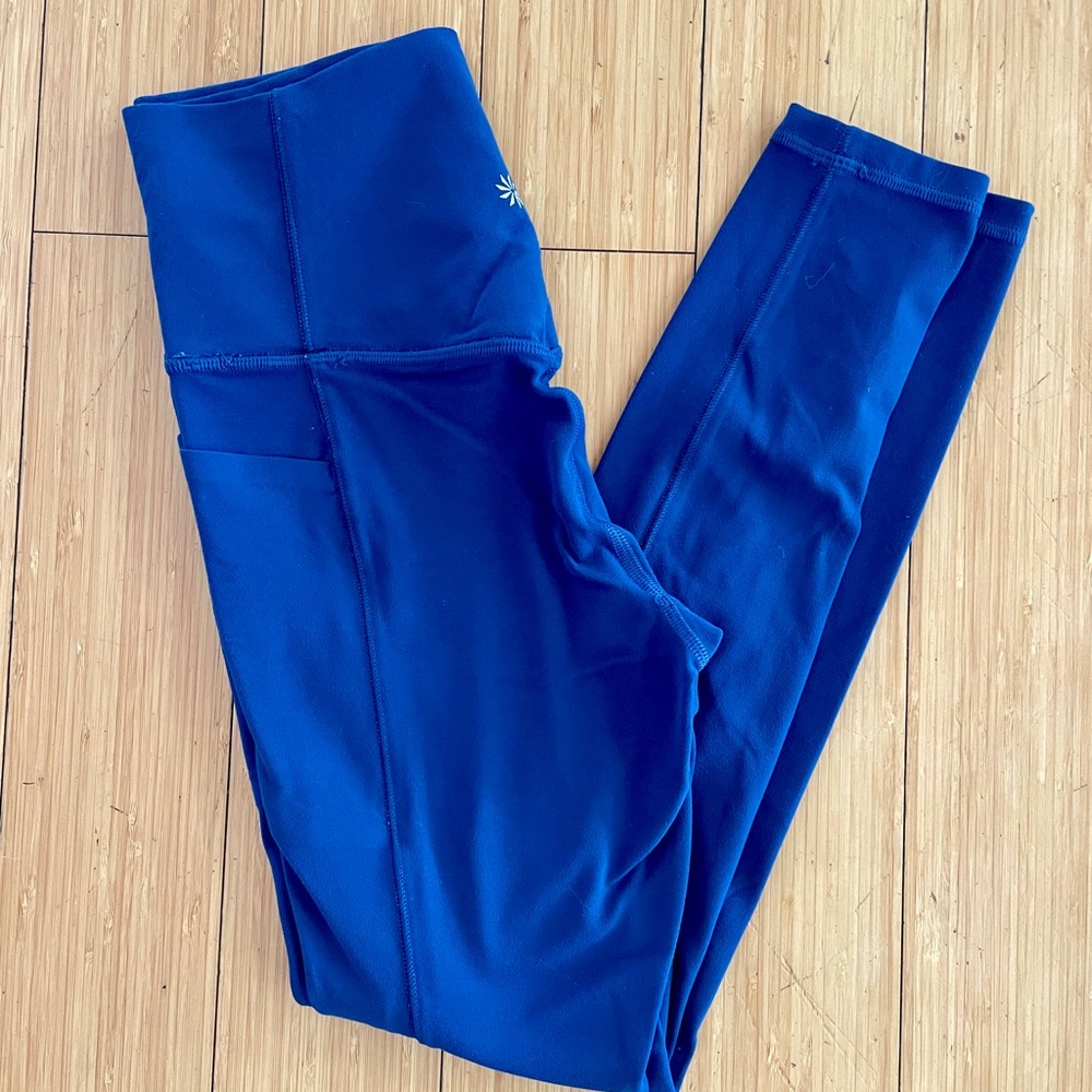 Athleta salutation stash pocket leggings bright blue